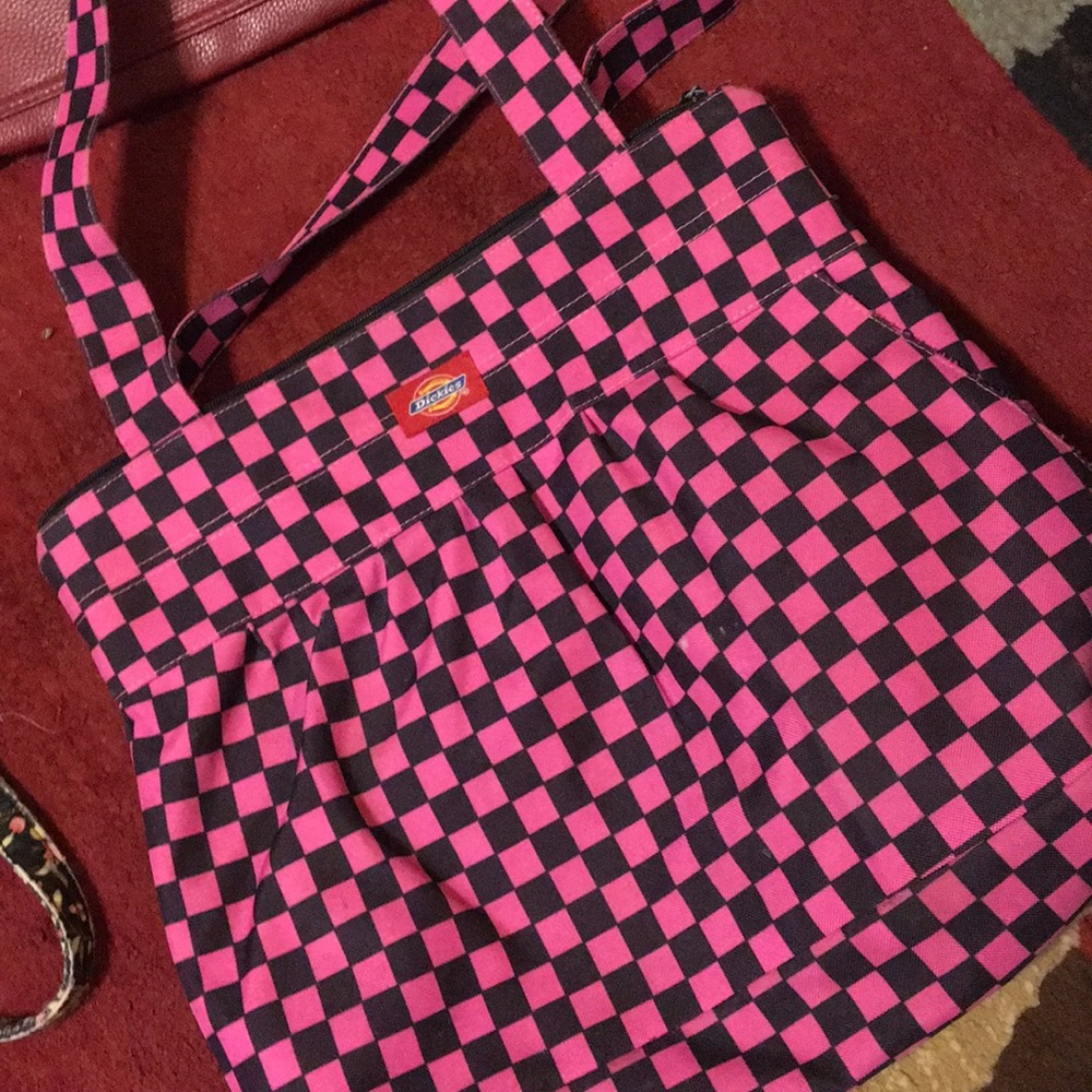 Pink and black purse